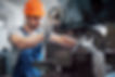portrait-young-worker-hard-hat-large-metalworking-plant.jpg
