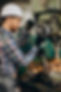 workman-wearing-hard-hat-working-with-metal-constructions-factory.jpg